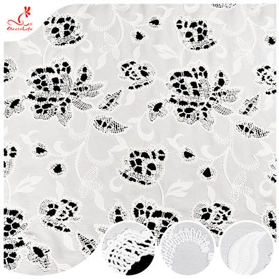 Vendite calde Tessuto ricamato bianco floreale soffice con occhio vuoto tessuto ricamato in poliestere